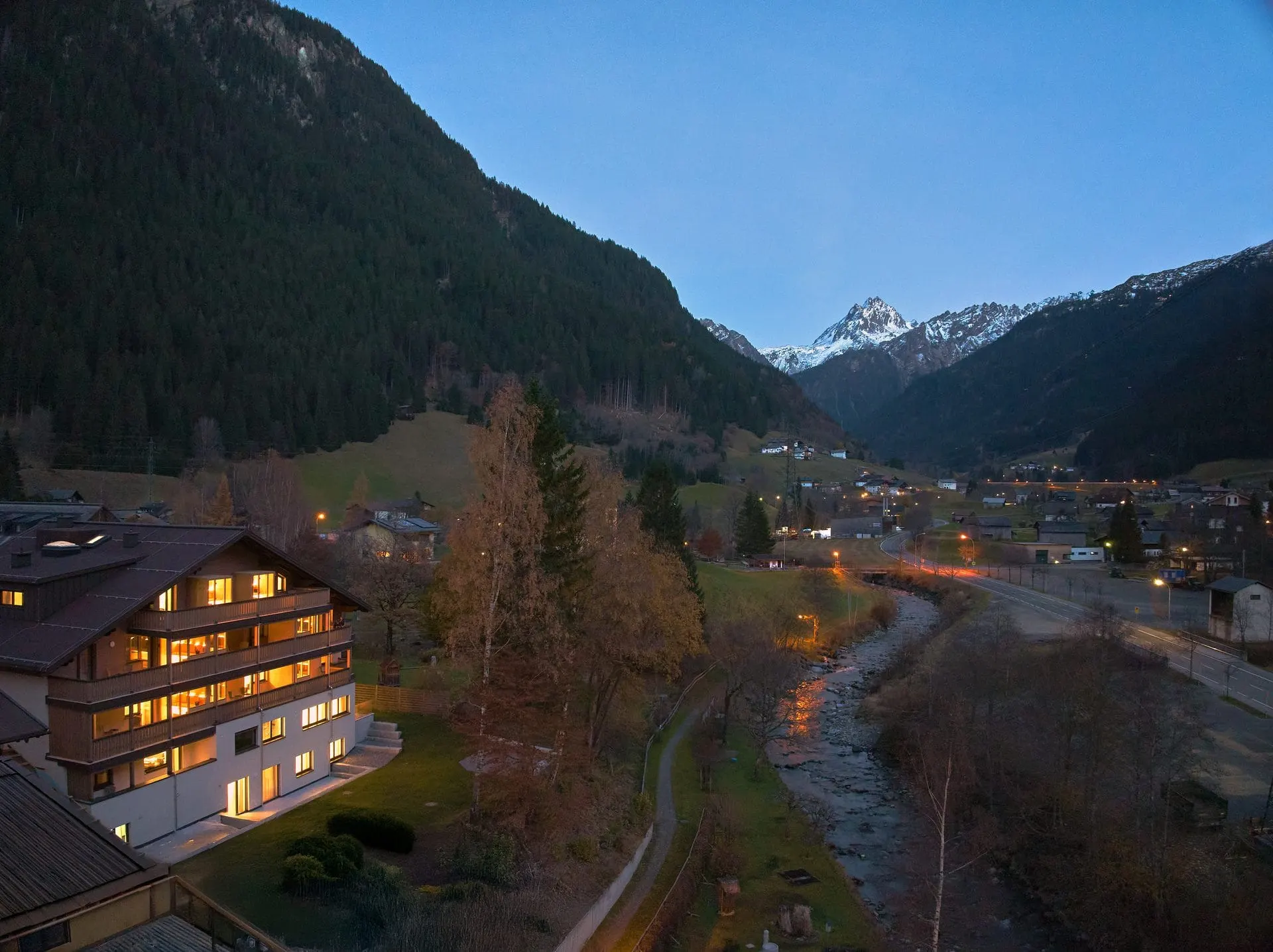 the Monika Aparthotel exterior in Gaschurn at dusk